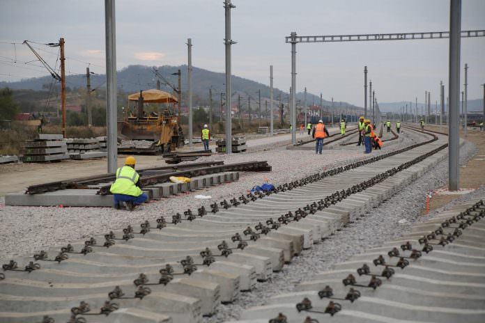 FCC workers construct two sections of track that have already been commissioned. Credit: FCC.