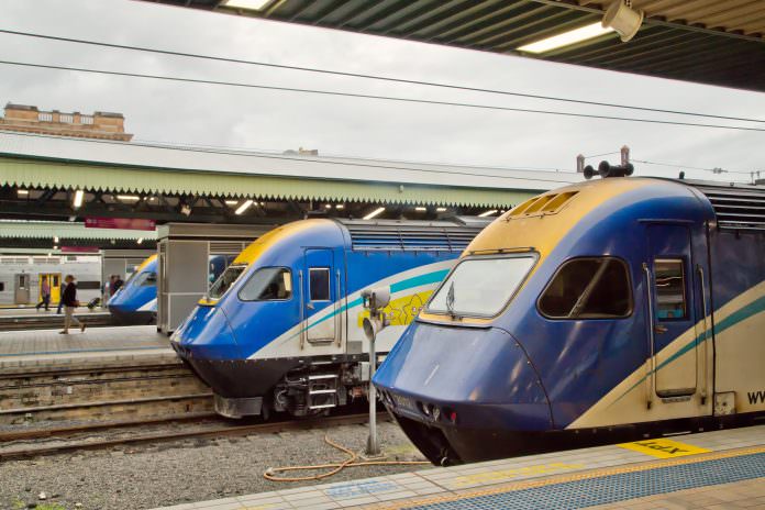 Three XPT trains wait at Central Station, Sydney. Credit: PomInOz/Shutterstock.