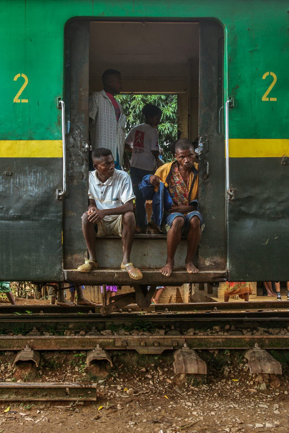 Passengers on board a train travelling on the Fianarantsoa-Côte Est railway in Madagascar (2013). Credit: Pierre-Yves Babelon/Shutterstock.
