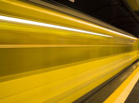 A blurred Naples metro train. Photo: ELEPHOTOS / Shutterstock.com.