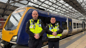 Quick-thinking guards rescue passenger under train